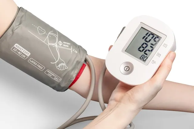 A man taking his blood pressure
